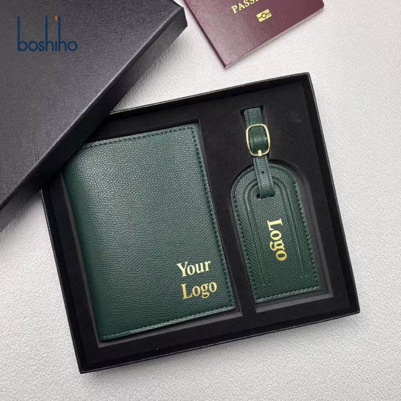 Green passport cover and luggage tag presented in a fitted gift box