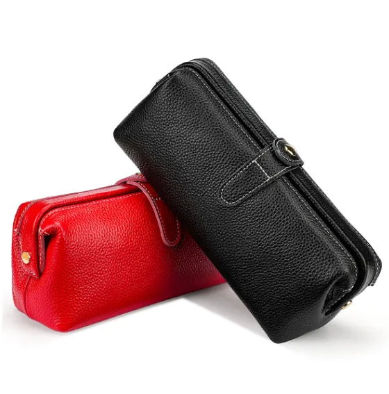 Red and black textured leather toiletry pouches