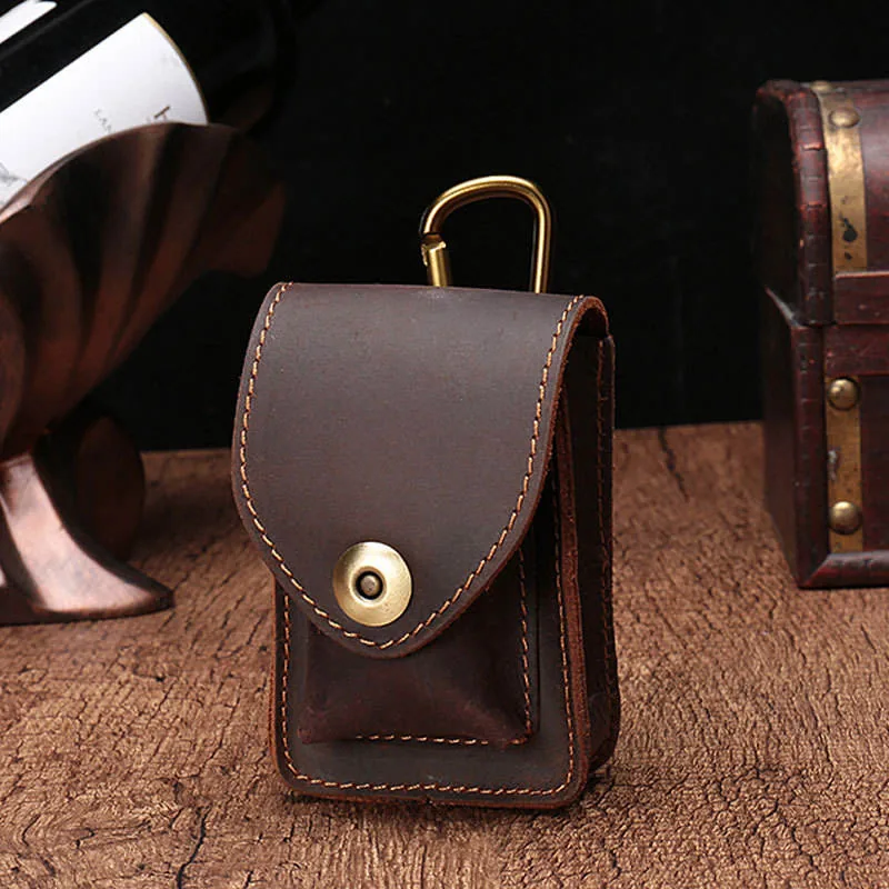 Closed empty brown leather case with snap flap
