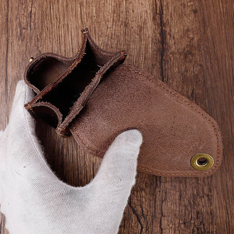 Empty leather case opened to show separate compartments