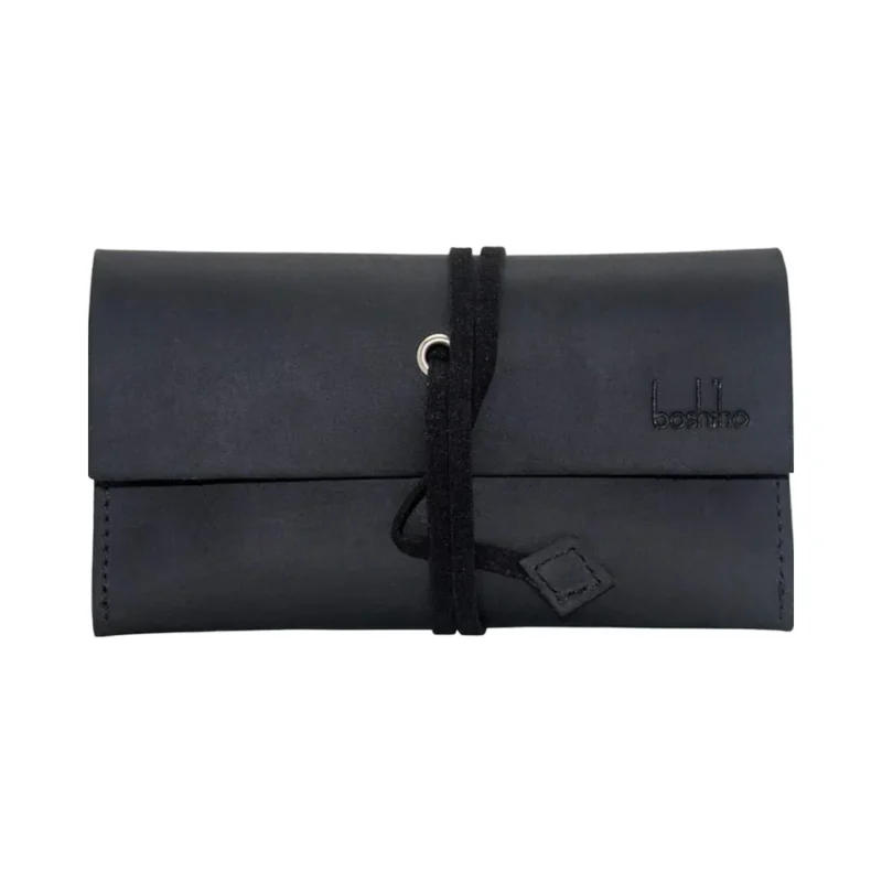 Closed empty black leather pouch with wraparound cord