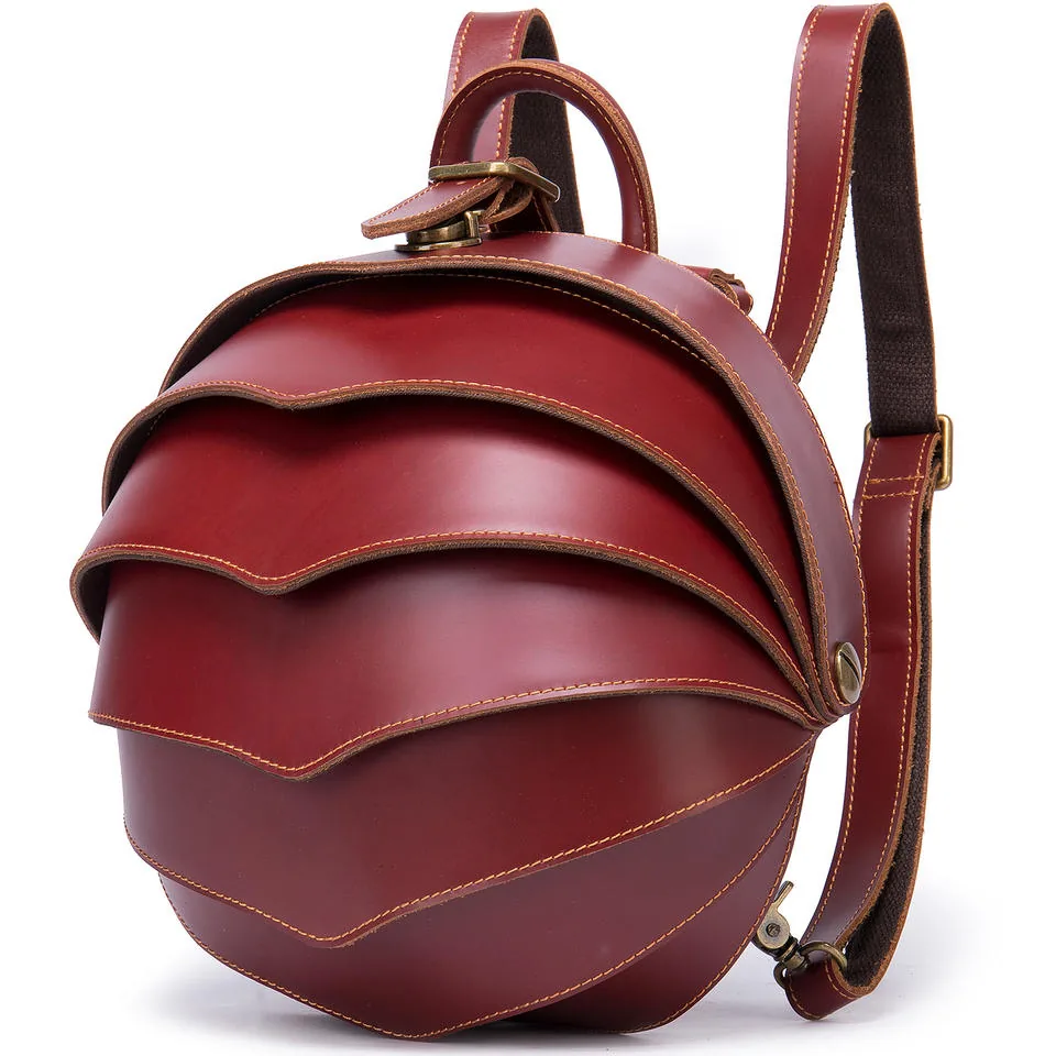 Red sculpted leather backpack with layered curved panels