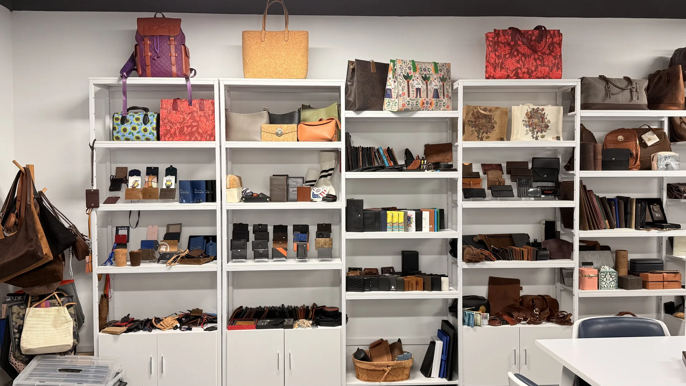 BOSHIHO showroom wall presenting leather goods and product collections