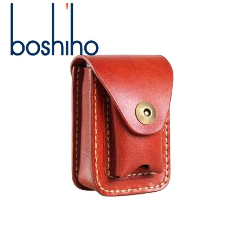 Empty red leather cover with snap flap and stitched front pocket