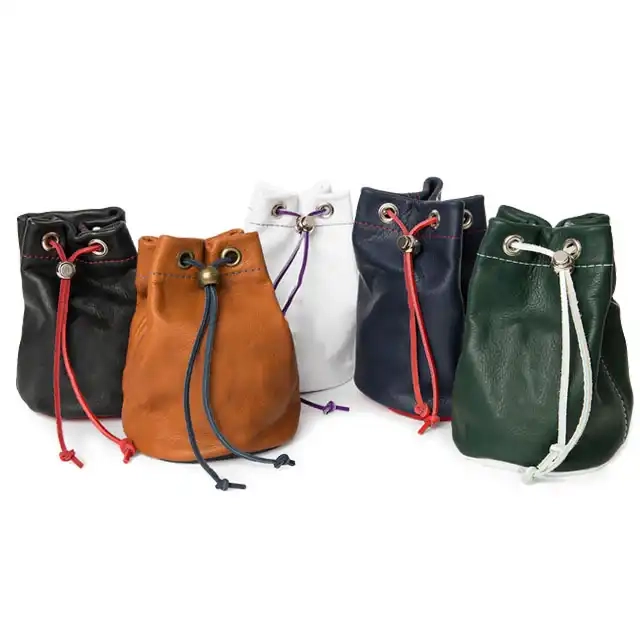 The leather drawstring bag is designed to store valuables such as golf balls, watches, or other accessories
